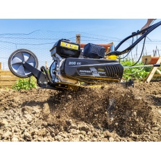 Motoculteur thermique 208 cc - 7 CV GARLAND avec roues métalliques, fraises et soc butoir.